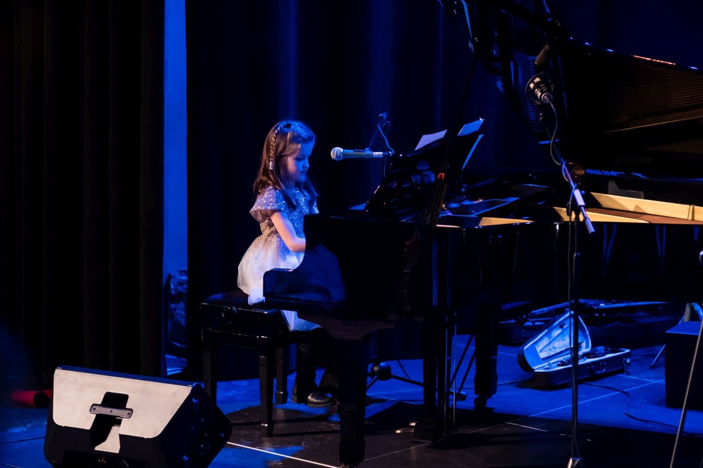 Student performing on stage